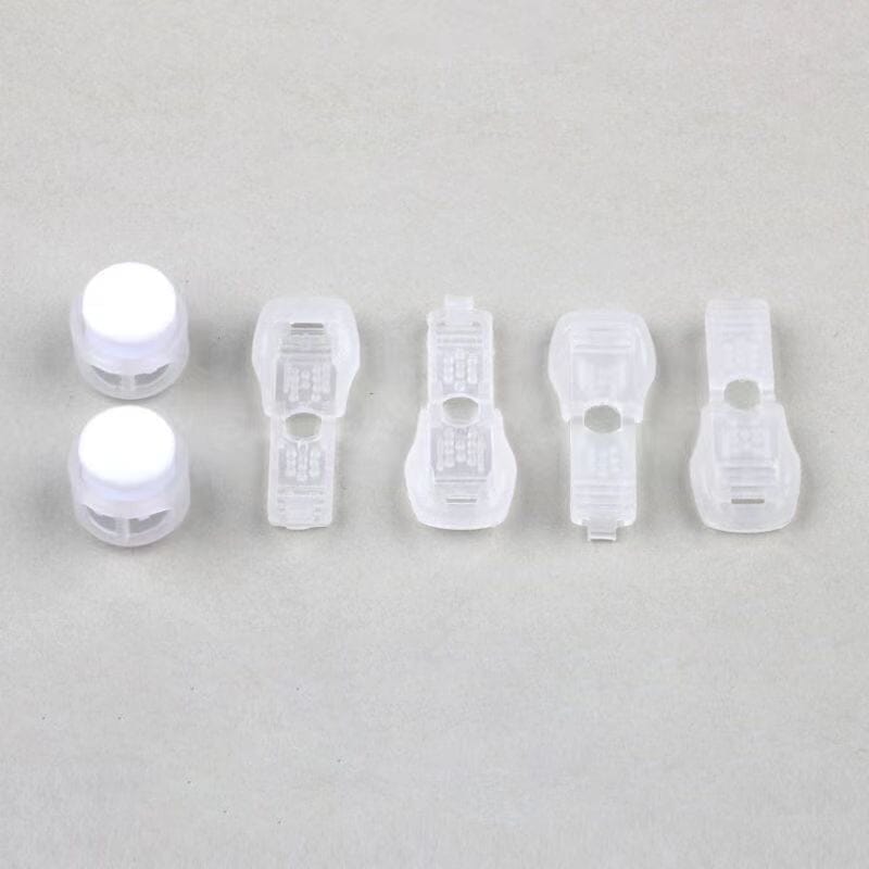 Säädettävä kengännauhojen lukituslaite