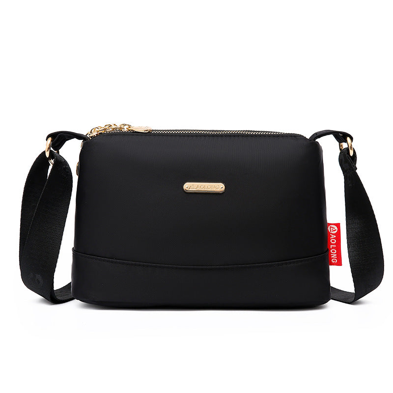 Naisten monitaskuinen painettu ristikkolaukku