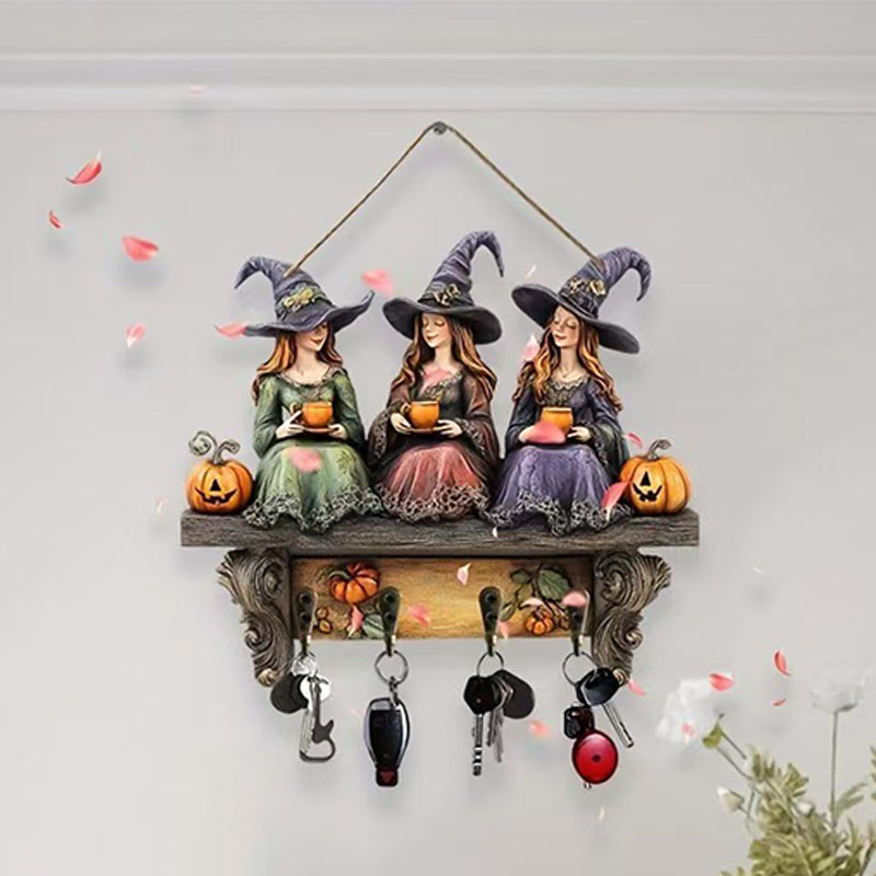 Lumoava Halloween-noitien seinäkoriste koukuilla