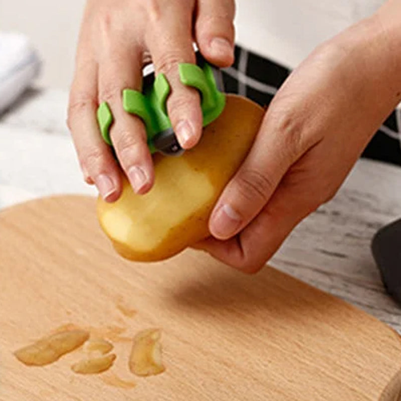 Monikäyttöinen käsikäyttöinen hedelmäkuorija