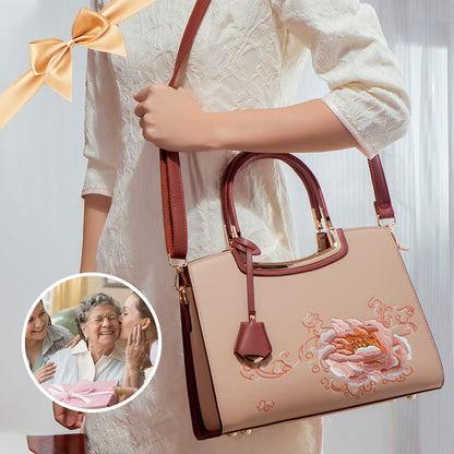 🎁Säästä jopa [40%] pois!👜Naisten tyylikäs käsilaukku, jossa on pioni-kirjonta