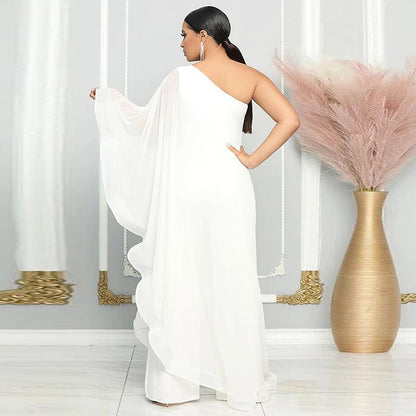 Rento ja tyylikäs yhden olkapään tilkkutäkkihaalari