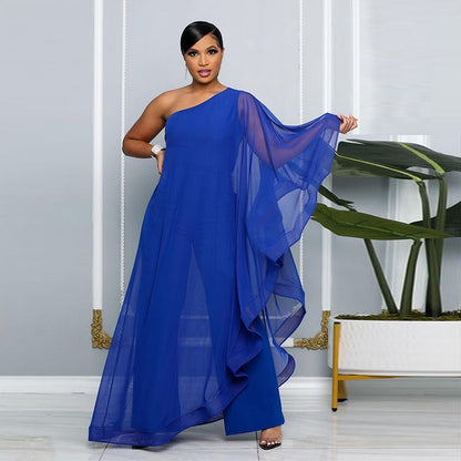 Rento ja tyylikäs yhden olkapään tilkkutäkkihaalari