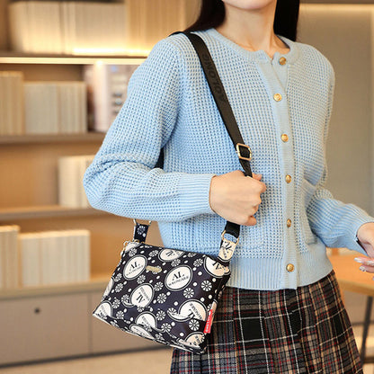 Naisten monitaskuinen painettu ristikkolaukku