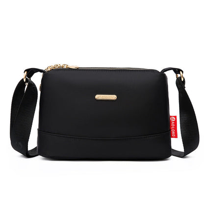 Naisten monitaskuinen painettu ristikkolaukku