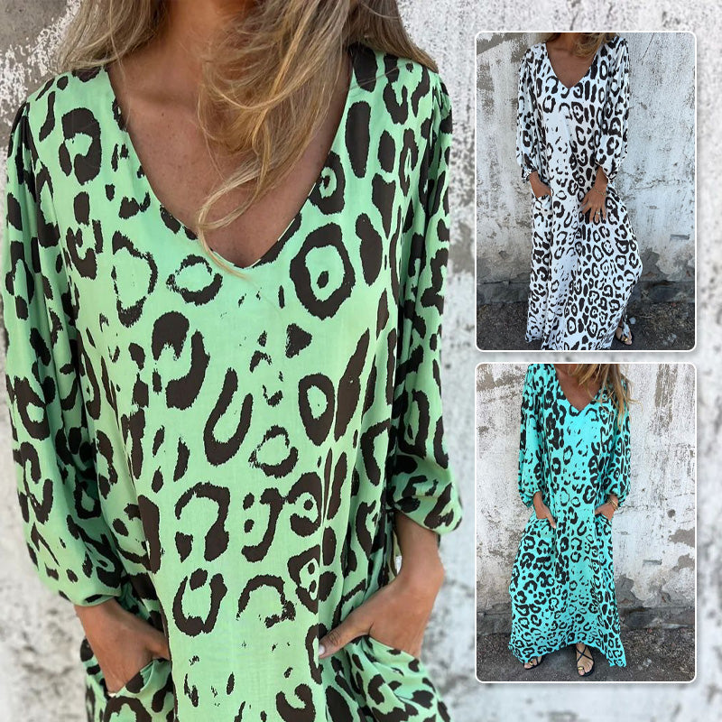 V-kaula-aukkoinen, kuvioitu, väljä mekko taskuilla