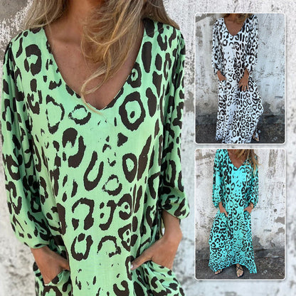 V-kaula-aukkoinen, kuvioitu, väljä mekko taskuilla