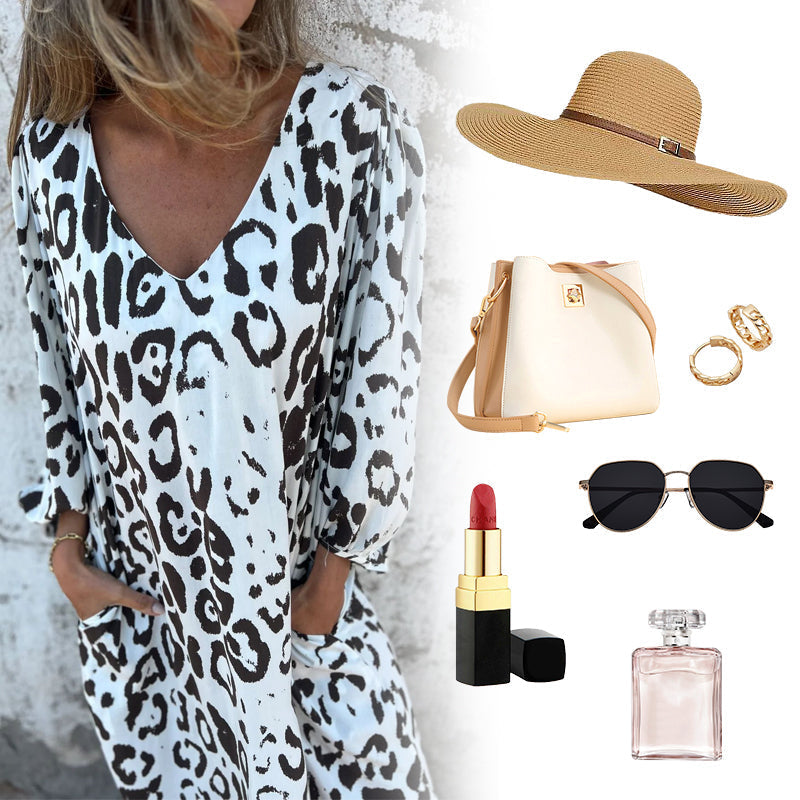 V-kaula-aukkoinen, kuvioitu, väljä mekko taskuilla