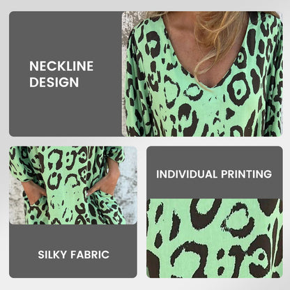 V-kaula-aukkoinen, kuvioitu, väljä mekko taskuilla