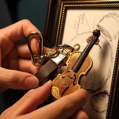 🎻Jopa 49 % alennusta!!🎵Tyylikäs viulun muotoinen avaimenperä