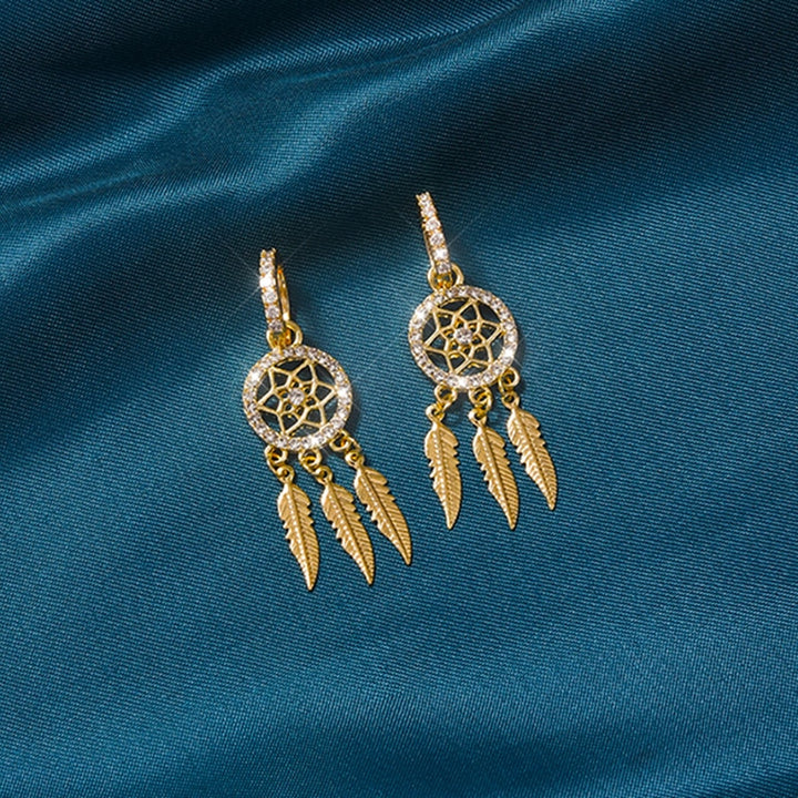 (🔥Uutuus - 48 % alennus)Dreamcatcher Crystal Charm korvakorut🔆