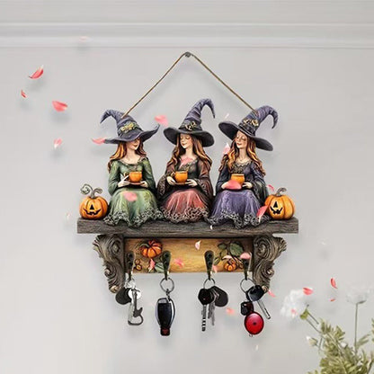 Lumoava Halloween-noitien seinäkoriste koukuilla