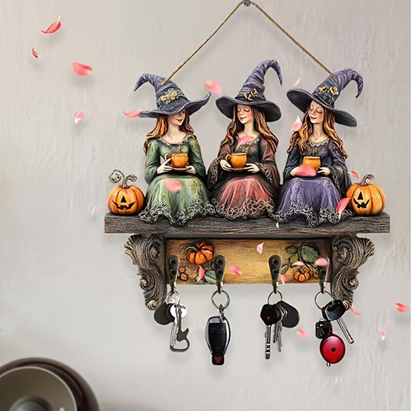 Lumoava Halloween-noitien seinäkoriste koukuilla