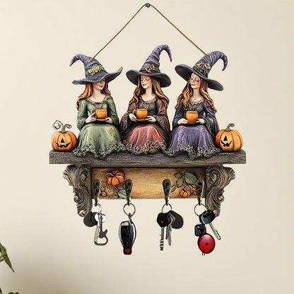 Lumoava Halloween-noitien seinäkoriste koukuilla