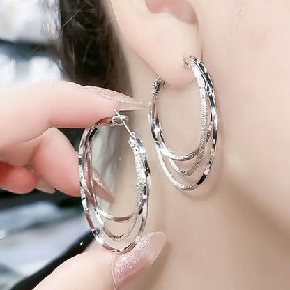 Monikäyttöiset kolmirinkularenkaat korvakorut