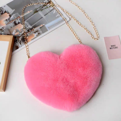 Muotin sydämenmuotoinen pörröinen olkalaukku Ystävänpäivänä